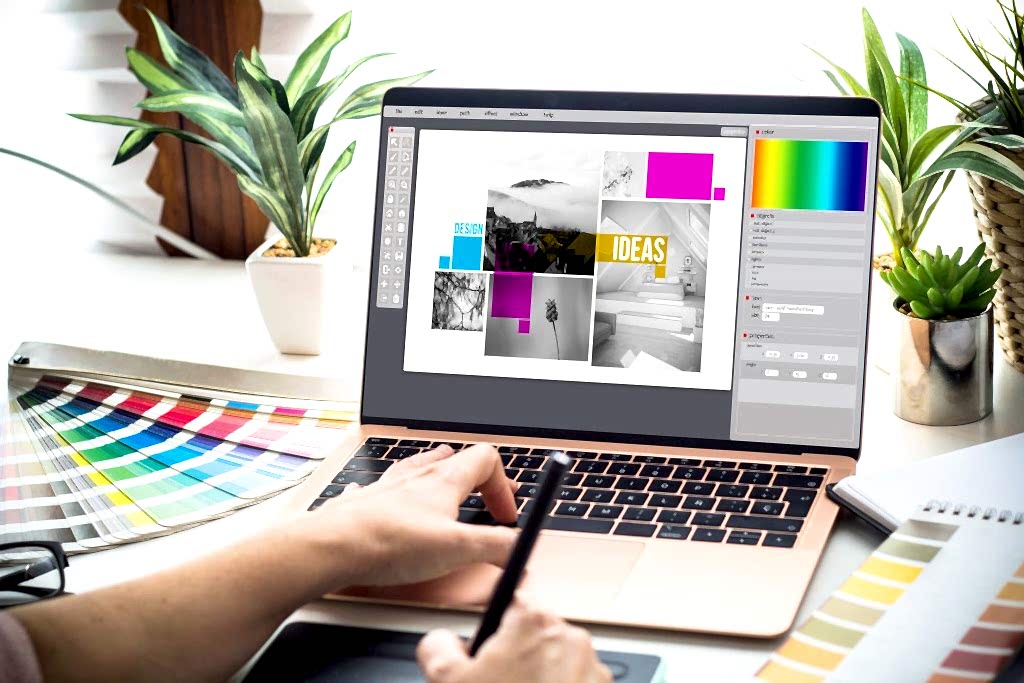 graphic-designer-woman-working-laptop-1024x683 DR MEDYA REKLAM AJANSI